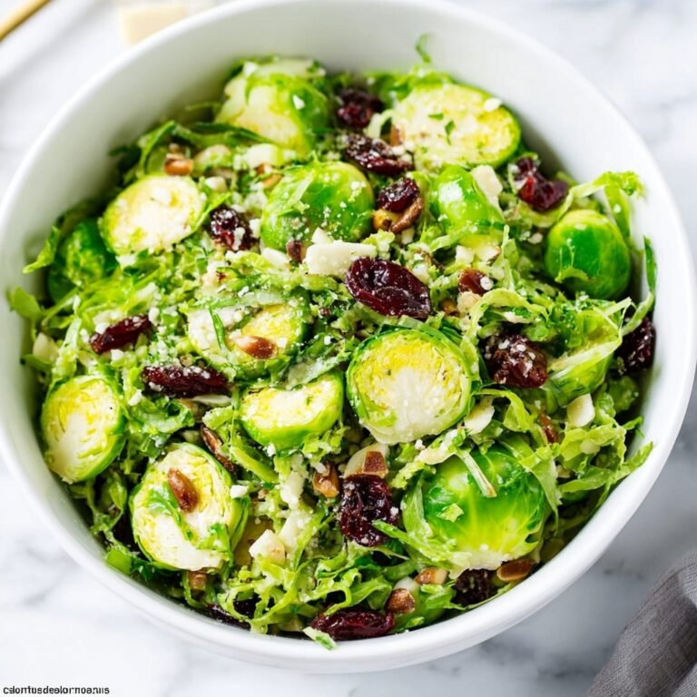 Shaved Brussels Sprouts Salad with Cranberries, Walnuts, and Parmesan Recipe